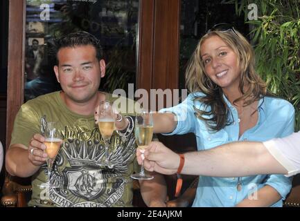 Jon Gosselin and his 23-year-old girlfriend Hailey Glassman with designer Christian Audigier posing at the polo club in Saint-Tropez, France on July 11, 2009. Jon and Kate Plus 8 is a reality television show produced in the United States by Figure 8 Films about the Gosselin family, consisting of parents Jon and Kate and their eight children: fraternal twins and sextuplets. The show follows the family through their daily lives, focusing on the challenges of raising multiple children. The show is currently one of the highest rated programs on TLC and the fifth season premiere was seen by a recor Stock Photo