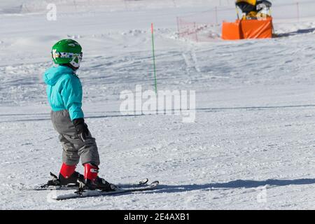 Little child skiing in Shahdag Ski Resort. sports activity for children. Gusar - Azerbaijan. 26 January 2019 Stock Photo