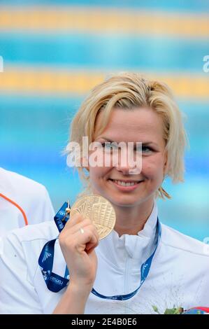 Germany's Britta Steffen celebrates on the podium after winning the final of the 50 Meters Freestyle at the FINA Swimming World Championships in Rome, Italy on August 2st, 2009. Photo by Henri Szwarc/ABACAPRESS.COM Stock Photo