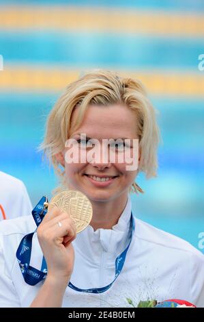 Germany's Britta Steffen celebrates on the podium after winning the 50 Meters Freestyle at the FINA Swimming World Championships in Rome, Italy on August 2st, 2009. Photo by Henri Szwarc/ABACAPRESS.COM Stock Photo