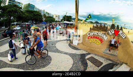 Rio de Janeiro, Brazil  January 22, 2019 Tourists on the Copacabana beach sidewalk Stock Photo