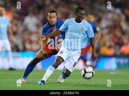 Barcelona's Thiago and Manchester City's Shaun Wright-Phillips battle for the ball during the Joan Gamper Trophy match between Barcelona and Manchester City at the Camp Nou Stadium in Barcelona, Spain on August 19, 2009. Manchester City won the match 1-0. Photo by Steeve McMay/ABACAPRESS.COM Stock Photo