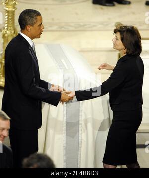 Barack Obama embraces widow Vicki Reggie Kennedy in front of the casket of US Senator Edward Kennedy inside the Basilica of Our Lady of Perpetual Help Catholic Church in Boston, Massachusetts for the funeral of Edward Kennedy on August 29, 2009. Pool photo by CJ Gunther/ABACAPRESS.COM Stock Photo