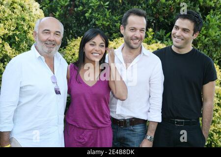 Gerard Jugnot and his wife Saida Jawad pose with cast members of 'Rose et noir' during the 2nd 'Angouleme Film Festival' held at Angouleme, France on August 29, 2009. Photo by Denis Guignebourg/ABACAPRESS.COM Stock Photo