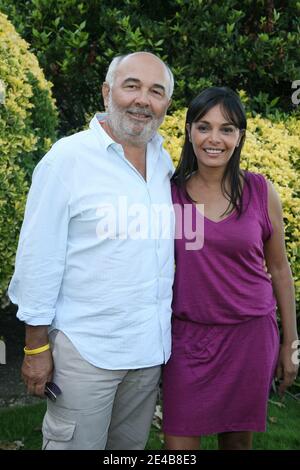 Gerard Jugnot and his wife Saida Jawad pose during the 2nd 'Angouleme Film Festival' held at Angouleme, France on August 29, 2009. Photo by Denis Guignebourg/ABACAPRESS.COM Stock Photo