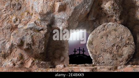 He is risen.Empty Tomb, open Door And Three Crosses In The Distance on sunset sky background with copy space for inscription. Jesus Christ Resurrections Stock Photo