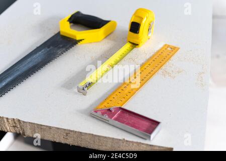 to cut holes in the kitchen countertop for equipment Stock Photo