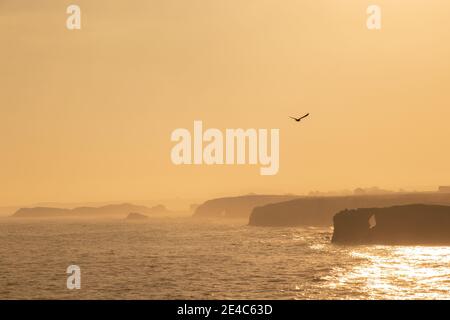 Sunset at Playa de Las Catedrales during the hide tide Stock Photo