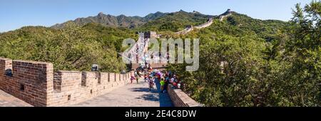 Tourists walking on a wall, Great Wall Of China, Beijing, China Stock Photo