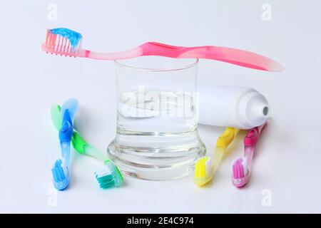 Healthy, well-kept teeth by brushing with toothbrushes and toothpaste Stock Photo