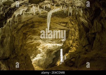 Cave with ice stalagmites and ice stalactites Stock Photo