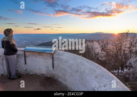 Gaaden, view from observation tower Wilhelmswarte at mountain Anninger to South with Wienerwald and Alps, rime ice on tree tops, sunset in Wienerwald / Vienna Woods, Niederösterreich / Lower Austria, Austria Stock Photo