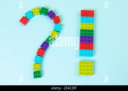 Question and punctuation marks made of colorful building toy blocks Stock Photo