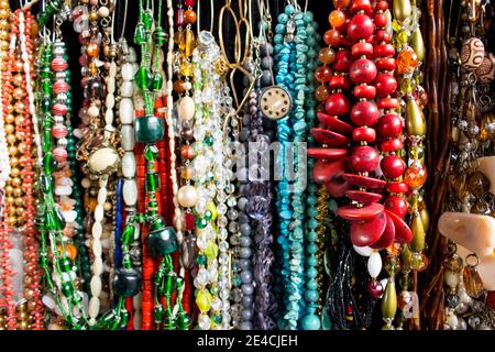 Multiples necklaces with pearls, seeds, stones and other materials. Different shapes, colors and sizes. Stock Photo