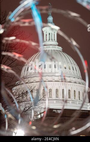 Security fencing surrounds Capitol Hill as snow blankets the region ...