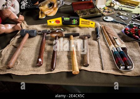 Sao Paulo / SP / Brasil - 01 03 18: Different kinds of tools like hammer for nails, gavel, knife, screwdriver and other things like doll, masks Stock Photo