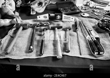 Sao Paulo / SP / Brasil - 01 03 18: Different kinds of tools like hammer for nails, gavel, knife, screwdriver and other things like doll, masks Stock Photo