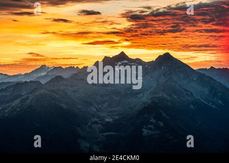 Sand in Taufers, Bolzano Province, South Tyrol, Italy. Sunrise at the summit of the Speikboden Speikboden with a view of the Dreiherrnspitze, Durreckspitze and the Großer Moosstock Stock Photo