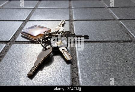 plastic keychain on the floor Stock Photo - Alamy