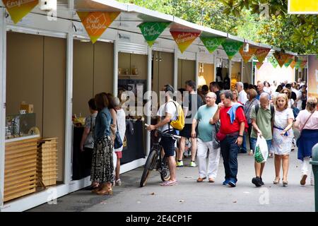 Coruna-Spain.People walking and stopping to buy in a fair of crafts and typical products of Galicia in the park of the city center on August 17, 2019 Stock Photo