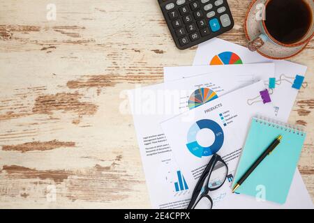 Business accounter working with documents and calculator on office desk, top view Stock Photo
