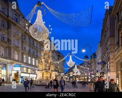 Vienna, street Graben, people shopping at the first day after Covid 19 lockdown, Christmas decoration in 01. Old Town, Austria Stock Photo