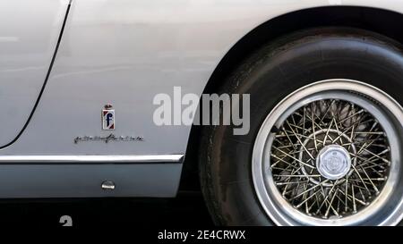 Rear wheel of a Ferrari 330 GT 2 + 2 (1964–1967) in Munich. Designed by Sergio Pininfarina Stock Photo