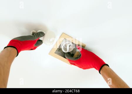 Replace the broken fluorescent light bulbs with LED bulbs. Stock Photo