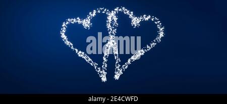 Heart shape from shining fairy lights against a blue background Stock Photo