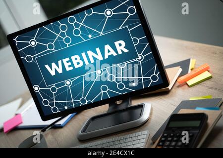 WEBINAR hand on table use E-business Browsing Connection in computer, coffee break in classroom to use cloud communication Stock Photo