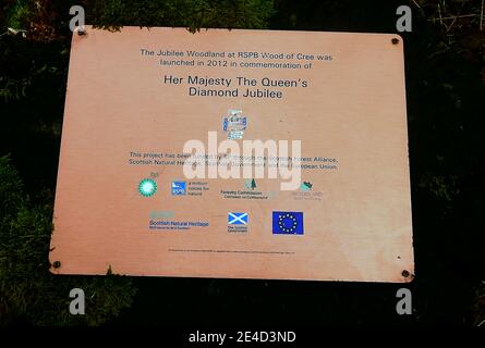 Commemorative plaque - Jubilee Woodland walk, Wood of Cree, Newton Stewart, Galloway, Scotland. Stock Photo