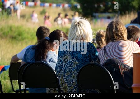 Multi-Cultural Office Staff Sitting Having Meeting Together Stock Photo