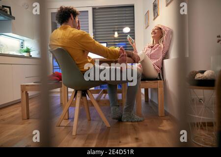 Cute couple spending time together at home; Bonding couple concept Stock Photo