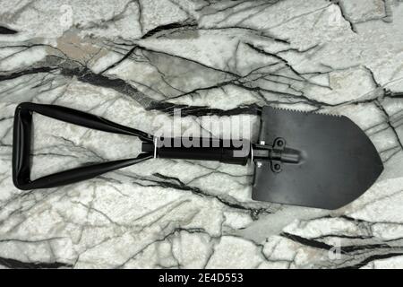 folding shovel isolated on white clipping camping compact . Stock Photo