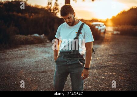 European man in casual clothes during the sunset Stock Photo