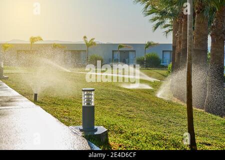 Garden automatic irrigation system. Smarter lawn sprinkler system. Close-up Stock Photo