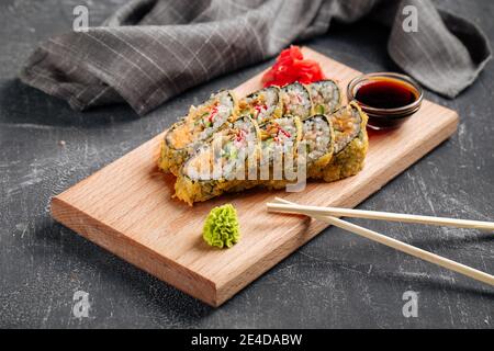 Tempura sushi rolls with cheese and crab meat Stock Photo