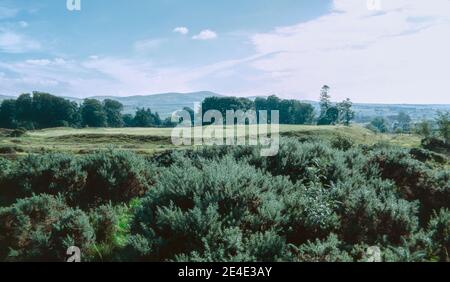 Remains of Ardoch Roman fort earthworks outside the village of Braco in Perthshire, Scotland, about 7 miles south of Crieff. Archival scan from a slide. September 1972. Stock Photo