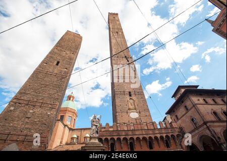 BOLOGNA, ITALY - SEPTEMBER 30, 2019: view of Torre Garisenda and Torre Degli Asinelli leaning towers Due Torri. Meaning Two towers Stock Photo