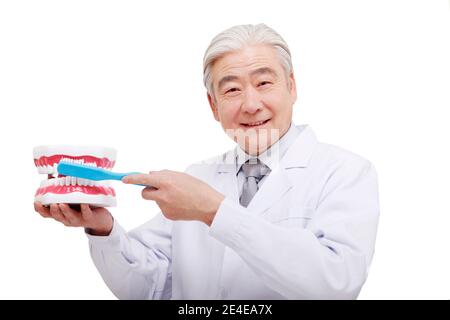 View of man brushing his teeth. (Photo by Kristian Tuxen Ladegaard Berg ...