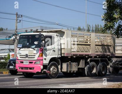 Chiangmai, Thailand -   November 30 2020:    Trailer Dump truck of Thanachai Company. On road no.1001, 8 km from Chiangmai city. Stock Photo