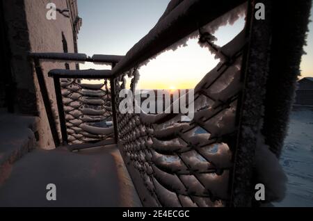 Abandoned hotel. Sunset on a frosty evening Stock Photo