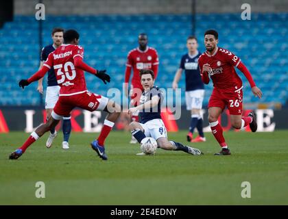 The Den, Bermondsey, London, UK. 23rd Jan, 2021. English FA Cup Football, Millwall Football Club versus Bristol City; Ben Thompson of Millwall slides into the tackle to clear the danger Credit: Action Plus Sports/Alamy Live News Stock Photo