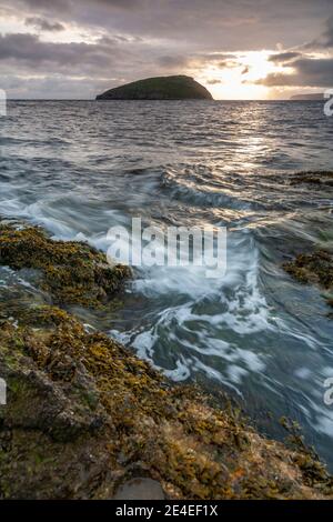 Sunrise over Puffin Island, Anglesey, North Wales Stock Photo