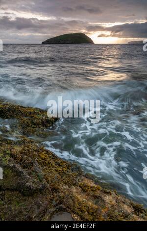 Sunrise over Puffin Island, Anglesey, North Wales Stock Photo