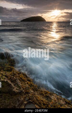 Sunrise over Puffin Island, Anglesey, North Wales Stock Photo