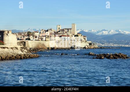 France, french riviera, Antibes, the Bastion, the old town, the ramparts, and the svowy Mrecantour massive. Stock Photo