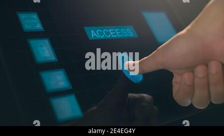 Close up human finger is touching interface computer monitor, fingerprint biometric identity and approval.  future security and password control throu Stock Photo