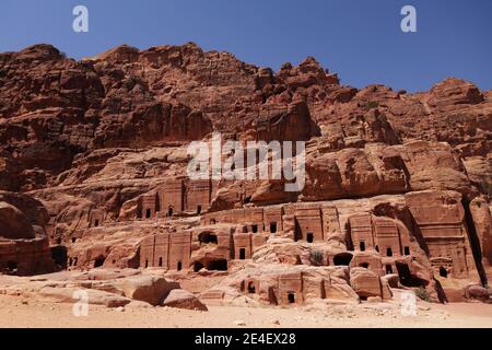 Streets of Petra with multiple carved buildings Stock Photo