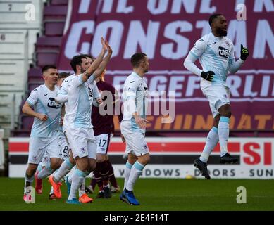 Scottish Championship - Heart of Midlothian v Raith rovers. Tynecastle Park, Edinburgh, Midlothian, UK. 23rd Jan, 2021. Hearts play host to Raith Rovers in the Scottish Championship at Tynecastle Park, Edinburgh. Pic shows: Raith Rovers' forward, Gozie Ugwu, is mobbed by teammates after scoring the opening goal for the visitors Credit: Ian Jacobs/Alamy Live News Stock Photo